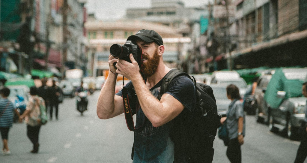 photographer taking pictures of a building